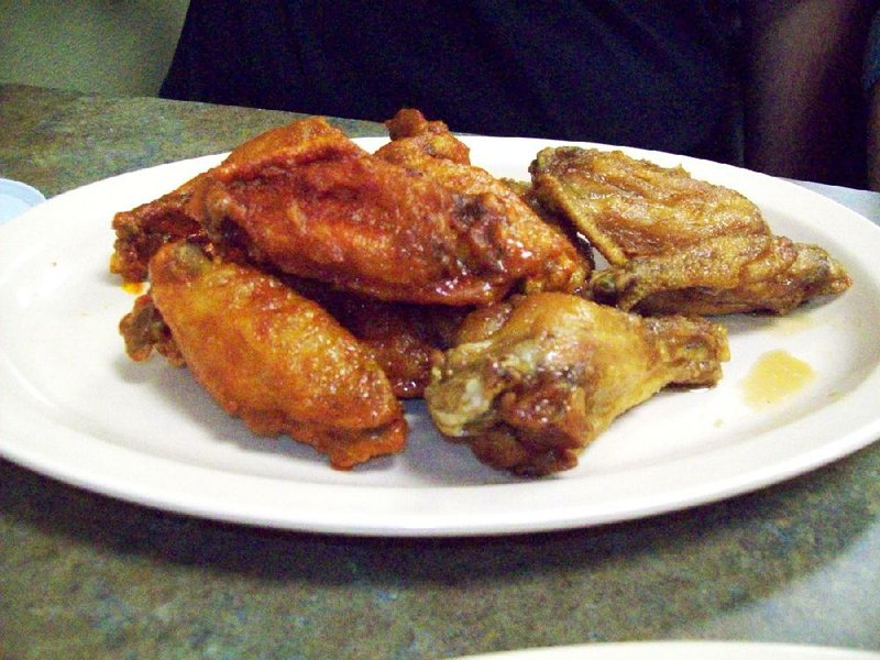 Buffalo hot and teriyaki are two wing flavors at All American Wings in North Little Rock. 