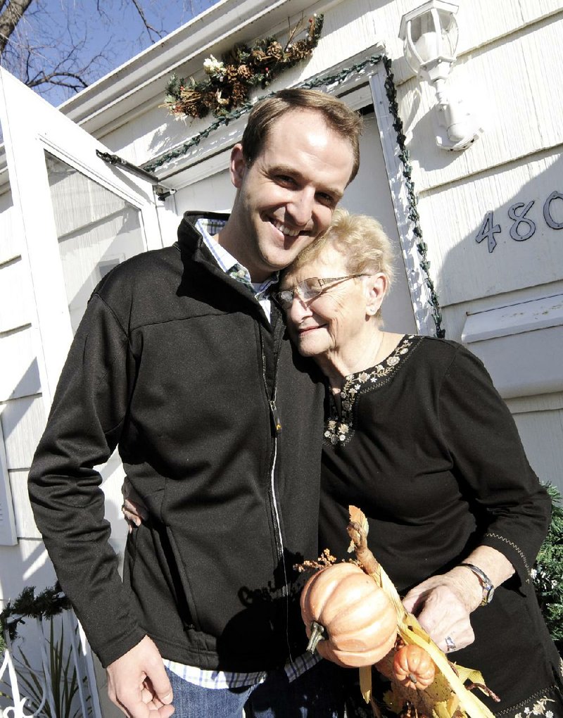 Jake Loesch hugs his grandmother, Bunny Arseneau, outside her home in Crystal, Minn. They’ve remained friends, even on Facebook, despite their differences on same-sex marriage and Loesch’s awkward conversations with other family members. 