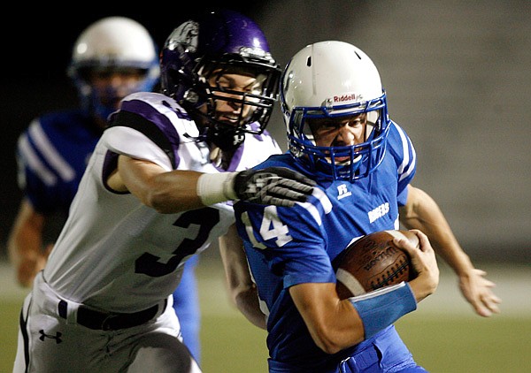 Max Harrell, a Rogers junior quarterback, is expected to lead the Mounties offense next season. 