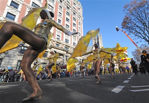 Dancers fill the street as the 86th annual Macy's Thanksgiving Day Parade moves down New York's Central Park West on Thursday.