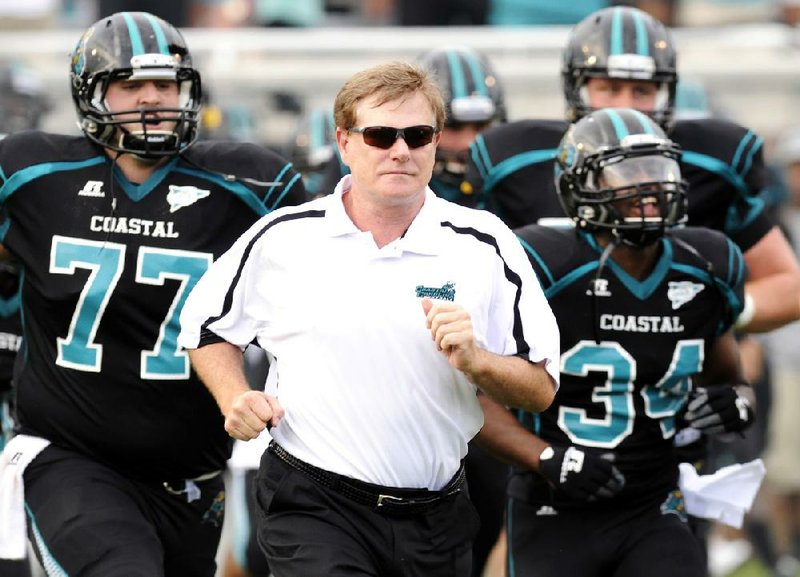 Coastal Carolina Coach Joe Moglia used business principles to build a winning football program at the school. 