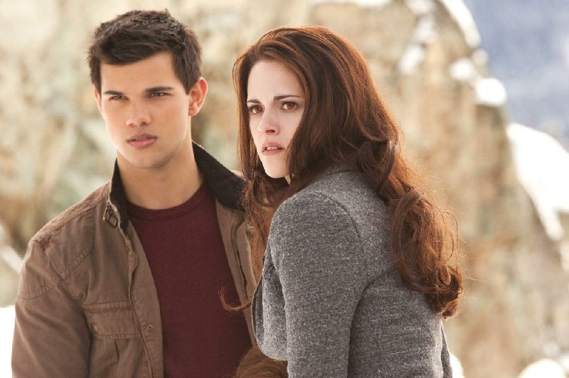 Taylor Lautner (left) and Kristen Stewart star in The Twilight Saga: Breaking Dawn — Part 2. The film came in No. 1 at last weekend’s box office, and made more than $141 million. 