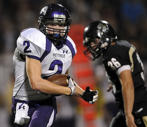 STAFF PHOTO MARC F. HENNING -- Fayetteville wide receiver Nathan Varady turns up field after a catch during the Bulldogs' game Friday, Sept. 24, 2010, against the Tigers at Tiger Stadium in Bentonville.