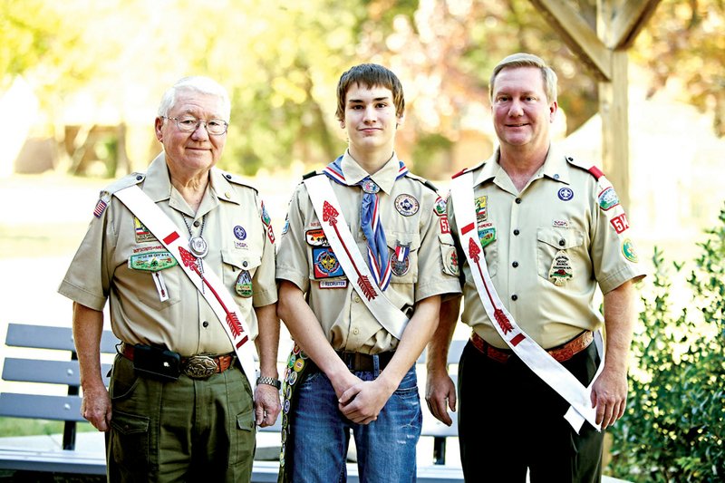 Chris Wilson, 17, center, of Conway was honored as an Eagle Scout this month in a Court of Honor ceremony at the Faulkner County Library, joining his grandfather, Dr. Joe T. Wilson Jr. of Jonesboro, and father, Russell Wilson of Conway. Eagle Scout is the highest rank attainable in Boy Scouting, and requirements include earning at least 21 merit badges and demonstrating Scout spirit through service and leadership, including completing a major project.