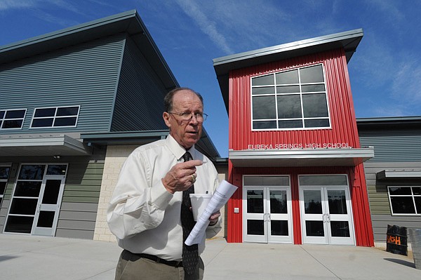 Eureka Springs School District Superintendent Curtis Turner talks at the south entrance of the new high school before a recent tour. The school opens Jan. 3. 
