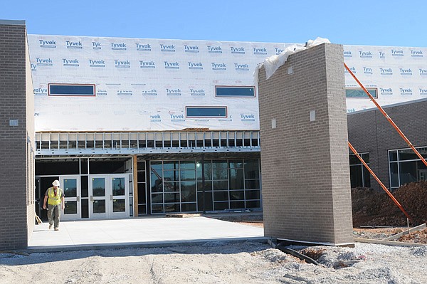 Janie Darr Elementary School is under construction Wednesday on Mount Hebron Road. Building the school requires the Rogers district to redraw its attendance boundaries. 