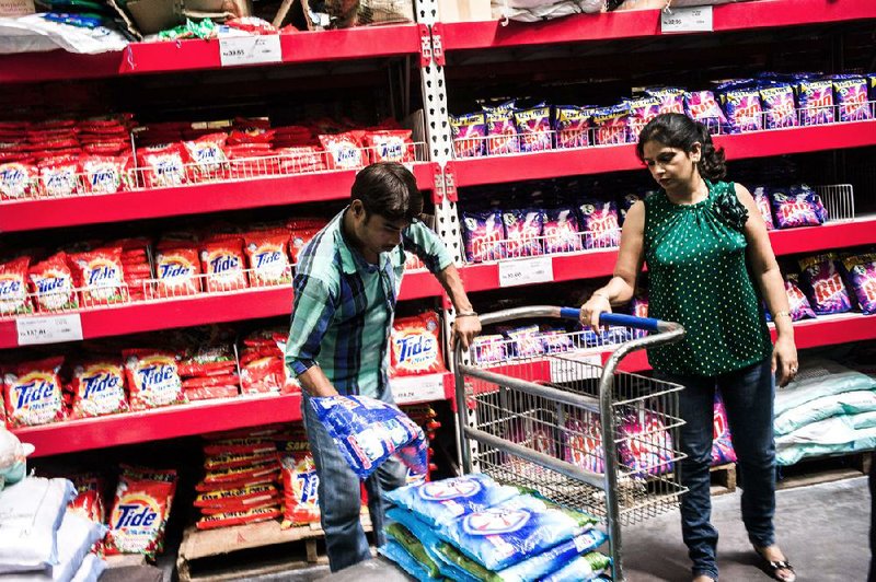 A shopper loads up on detergent at a Bharti Walmart Best Price Modern Wholesale store in Zirakpur, India, in September. 