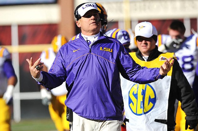 NWA Media/ANDY SHUPE
Louisiana State coach Les Miles gestures to his coaches Friday, Nov. 23, 2012, during the second quarter of play against Arkansas at Razorback Stadium.