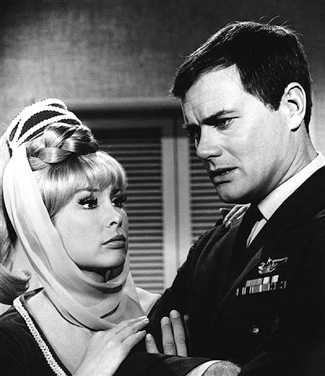 Larry Hagman appears with Barbara Eden in a scene of I Dream of Jeannie in 1967. 