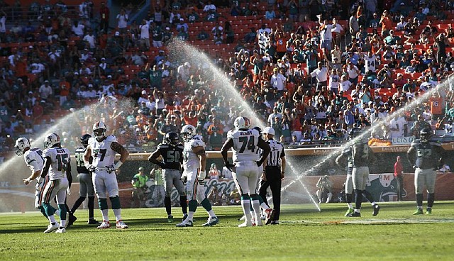 Several sprinklers were turned on during Sunday’s game between the Seattle Seahawks and Miami Dolphins in Miami. The Dolphins beat the Seahawks 24-21 on Dan Carpenter’s game-winning 43-yard field goal. 