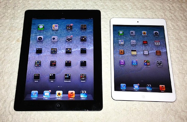 The iPad Mini (right) provides the abilities of a standard iPad, but in a smaller and thinner package. 