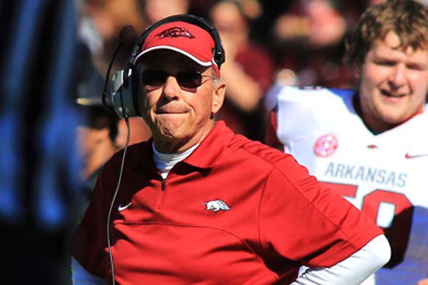 John L. Smith’s contract, which runs through February, includes a “right of reassignment” clause that Arkansas Athletic Director Jeff Long enacted Saturday. 