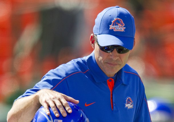 Boise State head coach Chris Petersen pats tight end Chandler Koch (88) on the helmet during warm-ups before their NCAA college football game against Hawaii on Saturday, Nov. 10, 2012, in Honolulu. (AP Photo/Eugene Tanner)