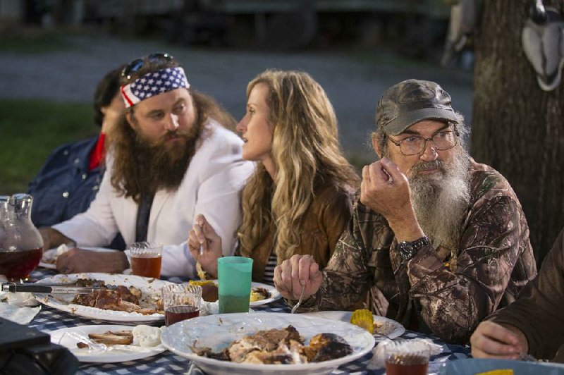 Duck Dynasty principals Willie and Korie Robertson (left and center) return to their alma mater, Harding University in Searcy, today for a presentation and book signing. 