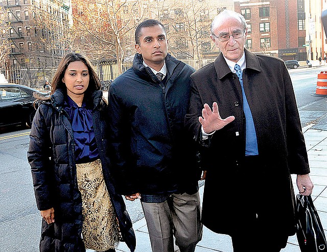 Mathew Martoma (center), former SAC Capital Advisors hedge fund portfolio manager, enters Manhattan federal court Monday with his attorney Charles Stillman. 