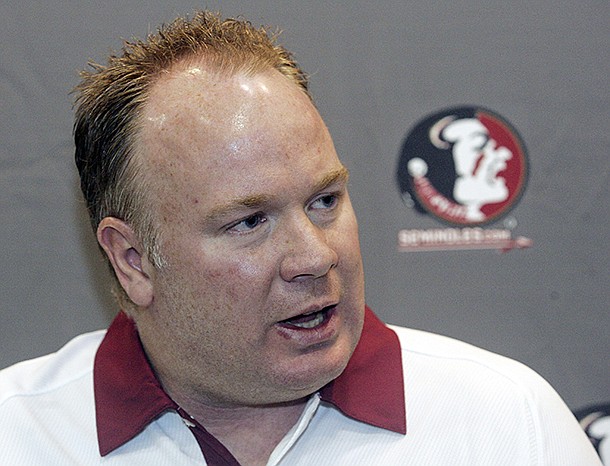 In this Aug. 12, 2012, file photo, Florida State defensive coordinator Mark Stoops is interviewed during the Seminoles' football media day in Tallahassee, Fla. Kentucky has hired Florida State defensive coordinator Mark Stoops as its new football coach. The university announced Tuesday, Nov. 27, 2012 that Stoops will replace Joker Phillips, who was fired on Nov. 4. (AP Photo/Phil Sears, File)