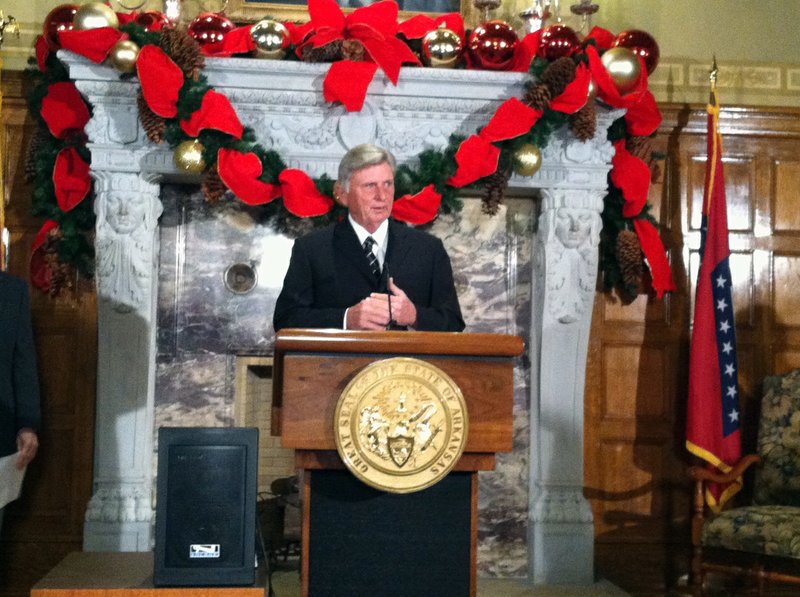 Gov. Mike Beebe speaks Tuesday at the state Capitol in Little Rock about a study done by the Battelle Technology Partnership Practice on university research in Arkansas.