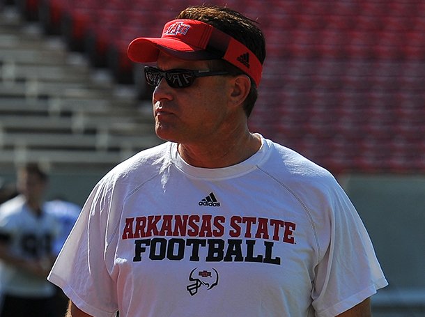 Arkansas State head coach Gus Malzahn looks on during a preseason practice in Jonesboro. 