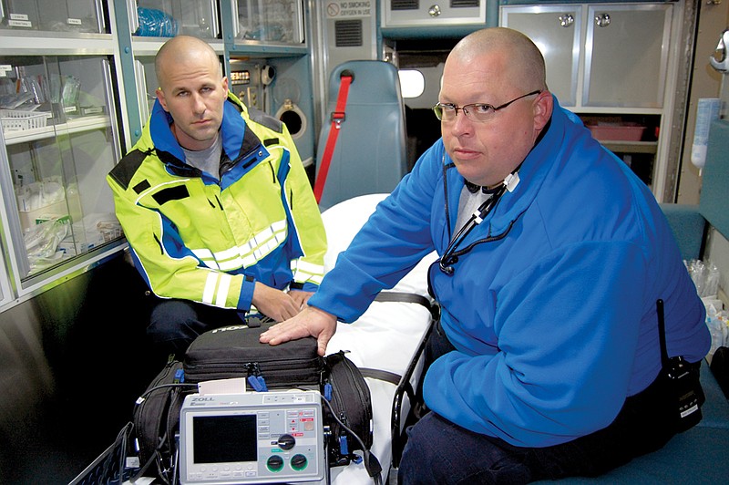 Emergency Medical Technician Tate Hamm, right, and Paramedic Mike Bowden have 12-lead electrocardiogram cardiac monitors available on all Saline Memorial Hospital ambulances. 