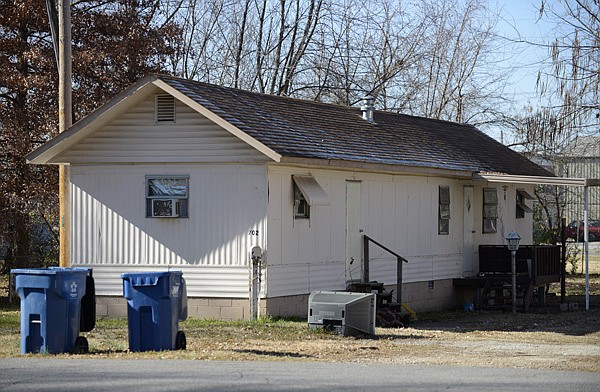 Police arrested Zachary Holly, 28, who lives in this home at 702 S.E. A St. in Bentonville on Monday in connection with the death of 6-year-old Jersey Bridgeman. 