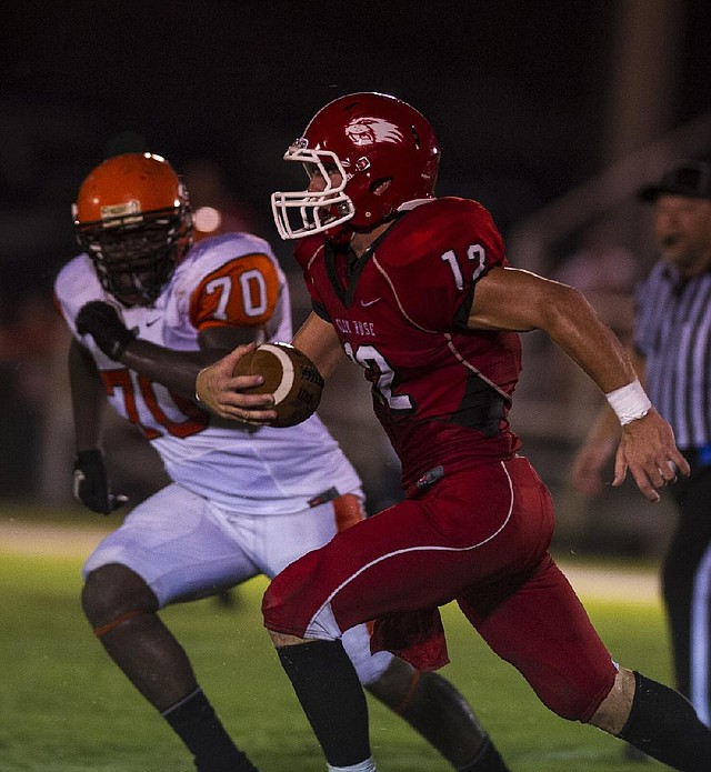 Quarterback Collin Hunter (12) and top-ranked Glen Rose have won 12 consecutive games since a 31-28 season-opening loss to Class 4A Malvern. 