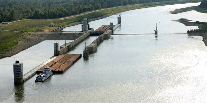 A towboat and barges enter the lock at Montgomery Point Lock and Dam in eastern Arkansas in this photo provided by the U.S. Army Corps of Engineers. 