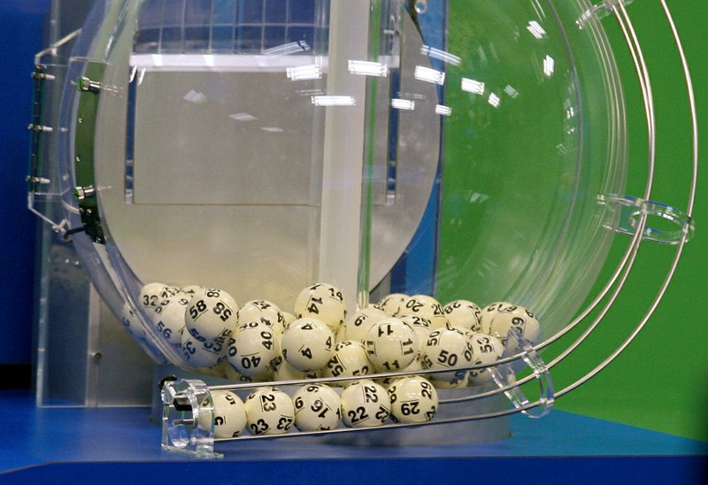 Powerball numbers are chosen in the drawing at the Florida Lottery on Wednesday, Nov. 28, 2012, in Tallahassee, Fla. The numbers drawn in the $579.9-million game were: 5, 16, 22, 23, 29 and Powerball of 6. 