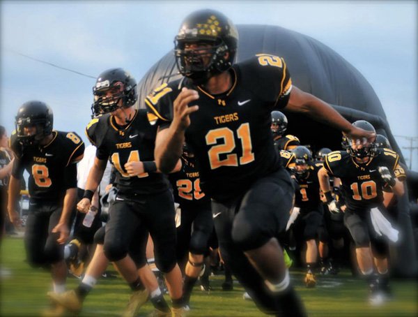 Prairie Grove is among several high schools throughout the state using inflatable mascots to introduce its team instead of players running through the traditional large paper banners before taking the field prior to games. 