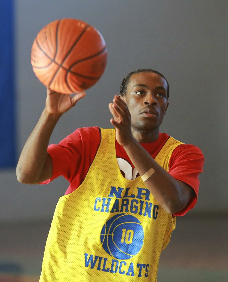 Senior point guard Dayshawn Watkins has shown he can be a scorer and a passer for North Little Rock this season, but first year Coach Johnny Rice would prefer to use him as a passer. “If he is scoring 25 a night for us, we’re not going to be very good,” Rice says. “That’s not a slap to his face, but as a point guard with the other weapons we’ve got, he’s got to get us set up, organized and running.” 