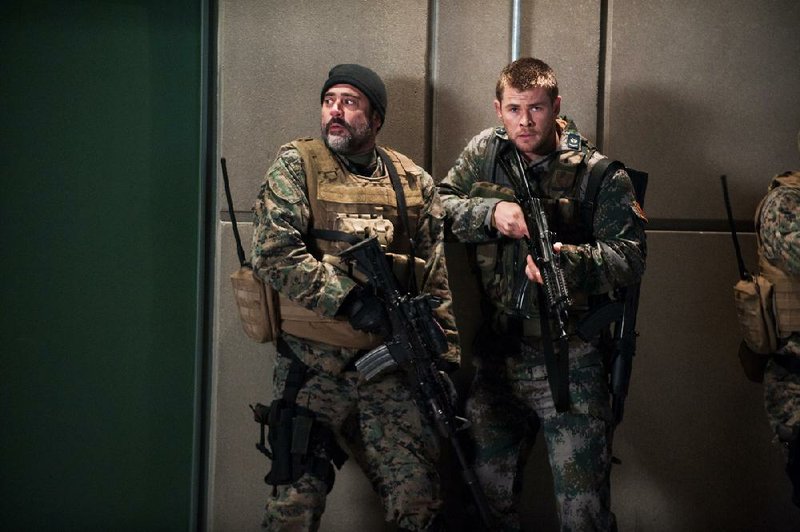 Jeffrey Dean Morgan (left) and Chris Hemsworth star in Red Dawn. The movie, which opened last weekend, came in No. 7 at the box office and made $14.2 million. 