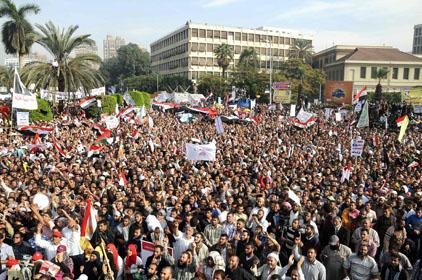 Supporters of Egyptian President Mohammed Morsi gather at Cairo University on Saturday. Muslim Brotherhood organizers, using tour buses, mustered more than 100,000 people at the rally. 