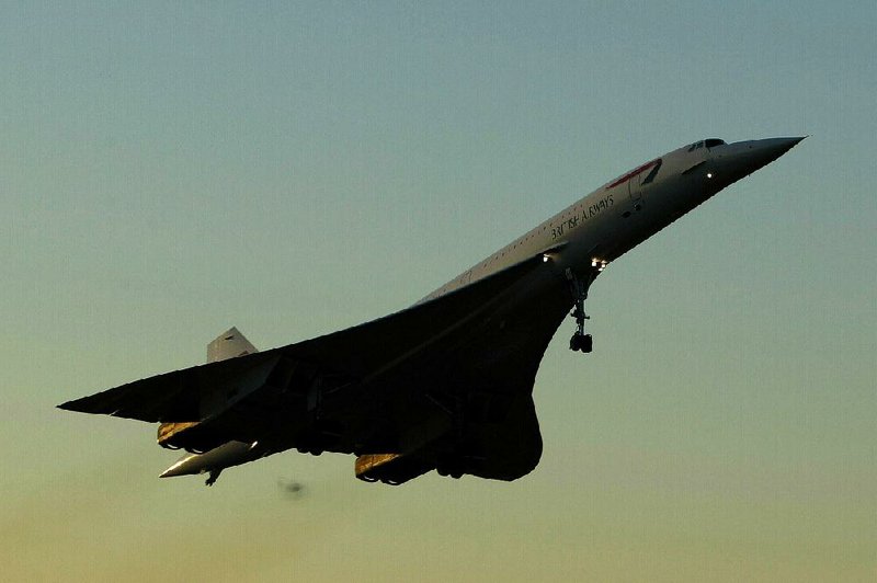 A British Airways Concorde takes off at sunrise from John F. Kennedy International Airport in New York for its last flight in 2003. 
