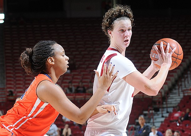 NWA MEDIA/SAMANTHA BAKER -- Arkansas' Sarah Watkins right, moves around the outside of Keitra Wallace of Pepperdine Sunday, Dec. 2, 2012, at Bud Walton Arena in Fayetteville. Watkins scored 18 points for the Razorbacks, beating Pepperdine, 64-39.