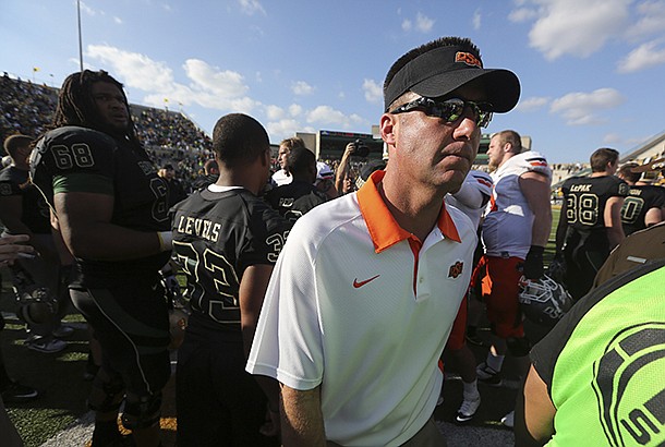 Oklahoma State coach Mike Gundy reportedly met with Arkansas following a loss to Baylor over the weekend. 