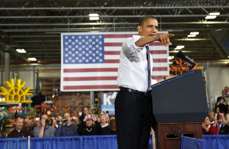 President Barack Obama speaks at The Rodon Group manufacturing facility Friday in Hatfield, Pa. Obama spoke at the toy company about how middle-class Americans would see their taxes go up if Congress fails to act to extend the middle- class tax cuts. 