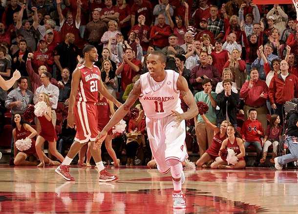 NWA Media/ANTHONY REYES -- Arkansas sophomore guard BJ Young charges upcourt after scoring the go-ahead basket against Oklahoma in the second half Tuesday, Dec. 4, 2012 at Bud Walton Arena in Fayetteville. The Razorbacks won 81-78.