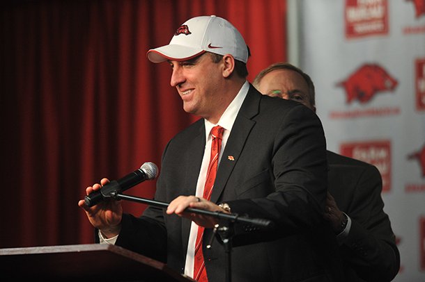 NWA Media/MICHAEL WOODS --12/05/2012-- Bret Bielema, the new University of Arkansas head football coach is introduced by athletics director Jeff Long during a press conference Wednesday afternoon. 