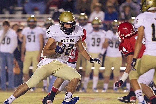 Pulaski Academy graduate Hunter Henry turns upfield during first-half action against Jacksonville on November 1, 2012. Henry signed to play for the Razorbacks this fall.