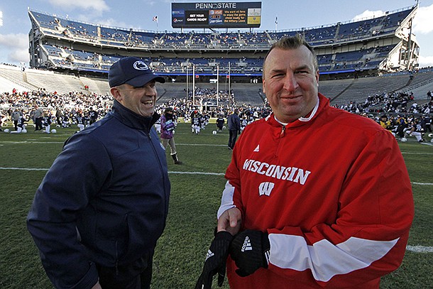 Bret Bielema (right) will make $3.2 million per year as head coach at Arkansas. 