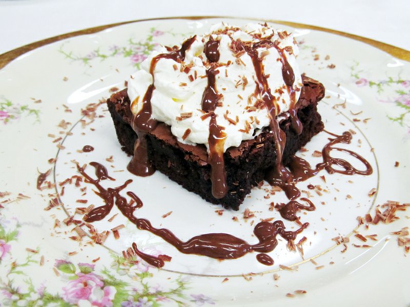National Brownie Day will be observed Saturday. The truly American dessert is made simply of cocoa, butter, eggs and flour but can be enhanced with a variety of ingredients, such as nuts, whipped cream, flavorings and additional chocolate.