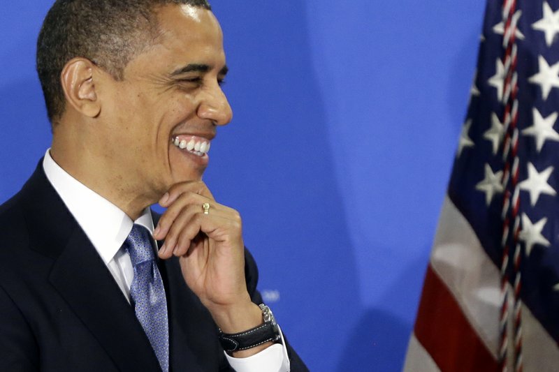 President Barack Obama is introduced by Jim McNerney, chief executive officer of The Boeing Co., before speaking about the "fiscal cliff" during an address before the Business Roundtable, an association of chief executive officers, on Wednesday, Dec. 5,2012, in Washington. 