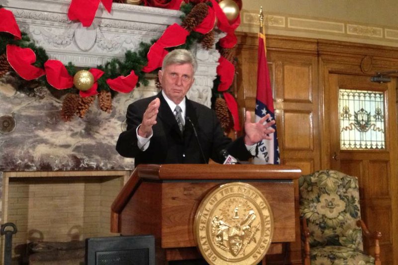 Gov. Mike Beebe speaks Wednesday in his conference room at the state Capitol.