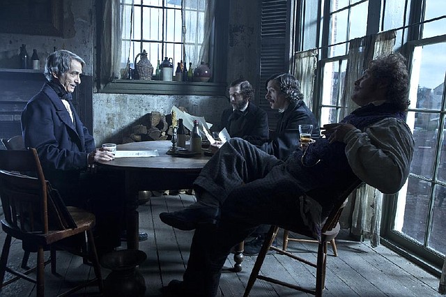 Secretary of State William Seward from left (David Strathairn) conspires with a trio of lobbyists, Richard Schell (Tim Blake Nelson), Col. Robert Latham (John Hawkes) and W.N. Bilbo (James Spader), in a pivotal scene in Steven Spielberg’s Lincoln, written by Tony Kushner. 