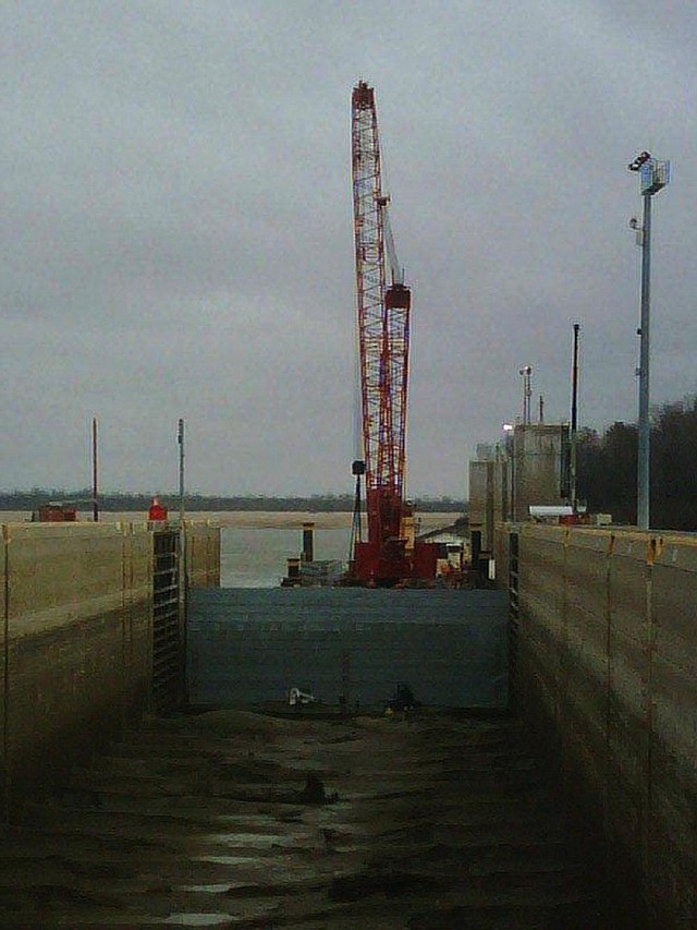 A temporary gate holds back water Wednesday at Montgomery Point Lock and Dam, allowing workers to repair hinges on lock gates. This photo was provided by the U.S. Army Corps of Engineers. 