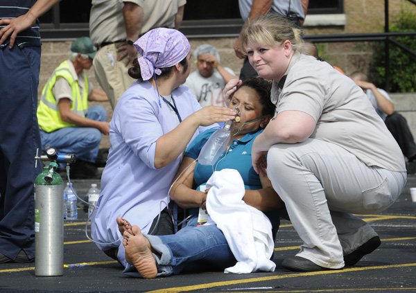 An employee at the Tyson Plant on Berry Street in Springdale passed out after being exposed to chlorine gas at the plant on June 27, 2011. She was given oxygen by other employees from the plant. 