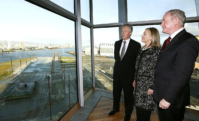 Secretary of State Hillary Rodham Clinton, accompanied by Northern Ireland’s First Minister Peter Robinson (left) and Deputy First Minister Martin McGuinness, visits Titanic Belfast, a center devoted to the history of the doomed ocean liner. 