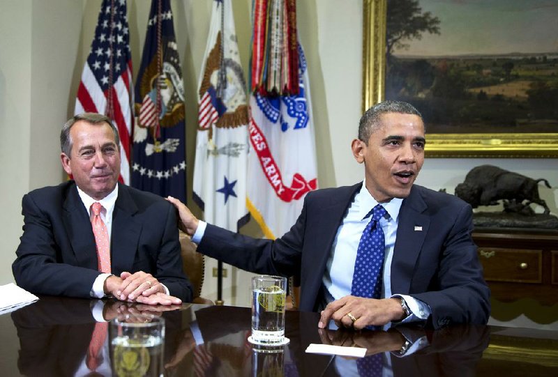 President Barack Obama (right) and House Speaker John Boehner met privately Sunday at the White House to discuss the ongoing negotiations over the impeding “fiscal cliff.” 