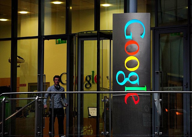 A pedestrian passes Gordon House, the European headquarters of Google Inc. on Barrow Street in Dublin, Ireland, earlier this year. Google used its Irish subsidiary as part of a legal effort to avoid an estimated $2 billion in corporate taxes potentially due in various countries in 2011. 