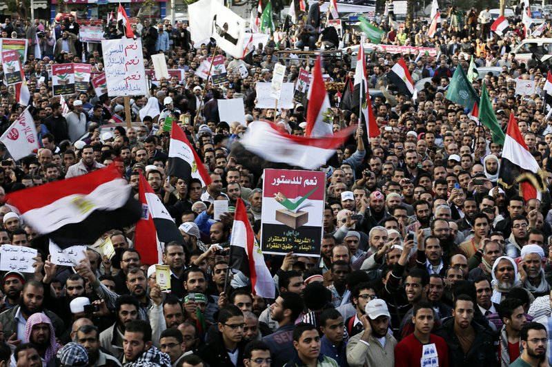 Supporters of Egyptian President Mohammed Morsi chant slogans during a demonstration in Cairo on Tuesday, Dec. 11, 2012. 