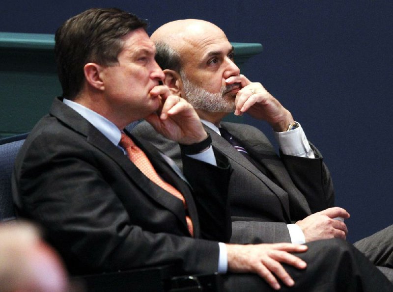 Federal Reserve Chairman Ben Bernanke (right) attends an event in Richmond, Va., with Jeffrey Lacker, president of the Federal Reserve of Richmond in 2010. 